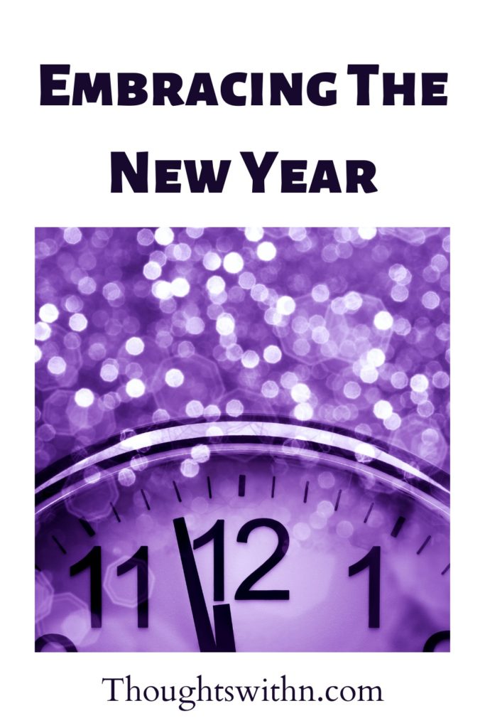 A purple clock is about to strike midnight on New Years Eve. The title reads Embracing The New Year.